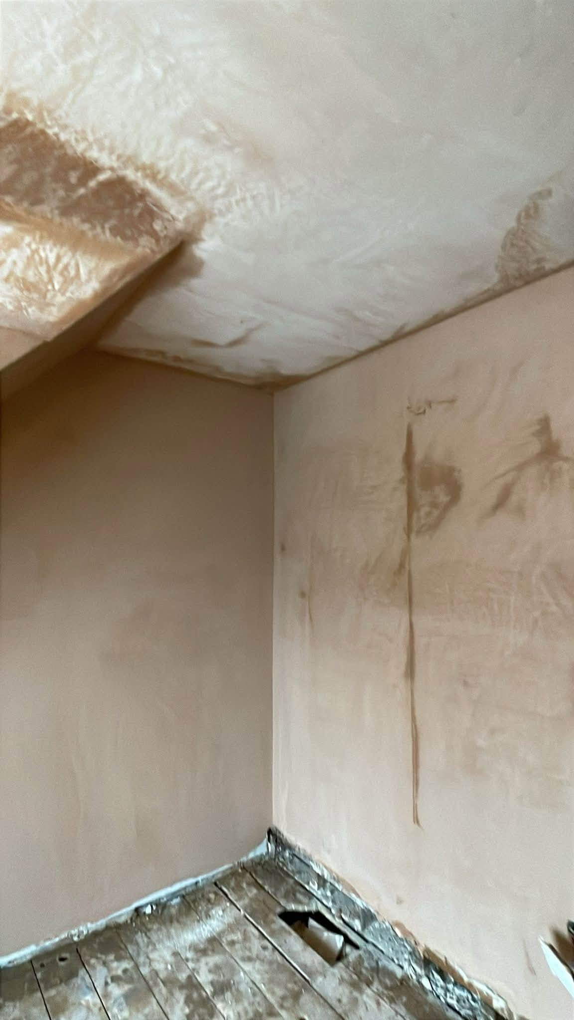 Close view of fresh plaster on the walls and ceiling
